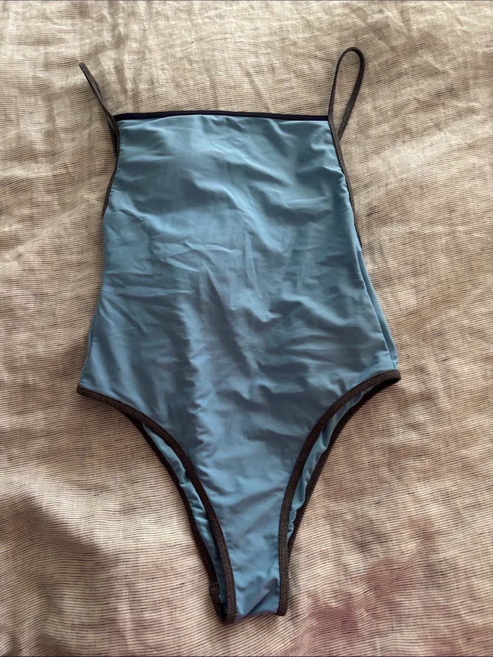 Sleek Blue Women's One-Piece Swim Bodysuit with Black Trim